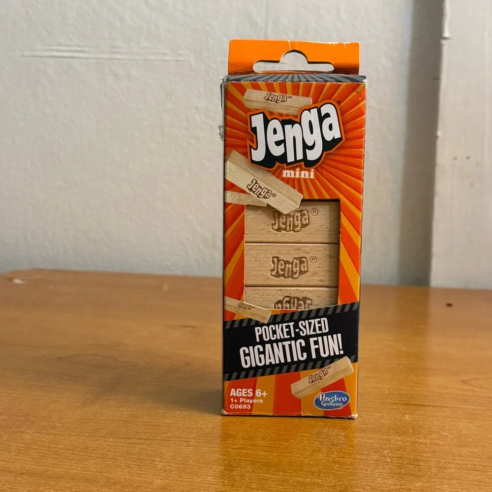 Hasbro Jenga Mini Game with‎ Red and Orange Packaging